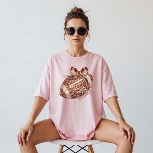 🏈 Sparkle & Spike: Gold Glitter Football Bow t-shirt. Touch down game ready